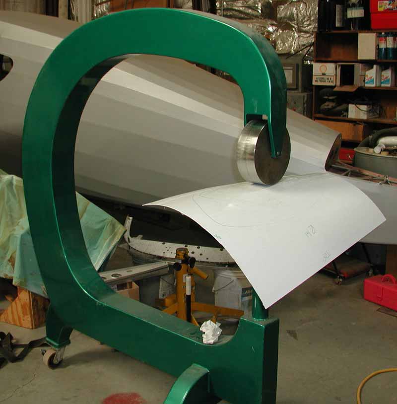 English Wheel being used to form a Swift fuselage skin.